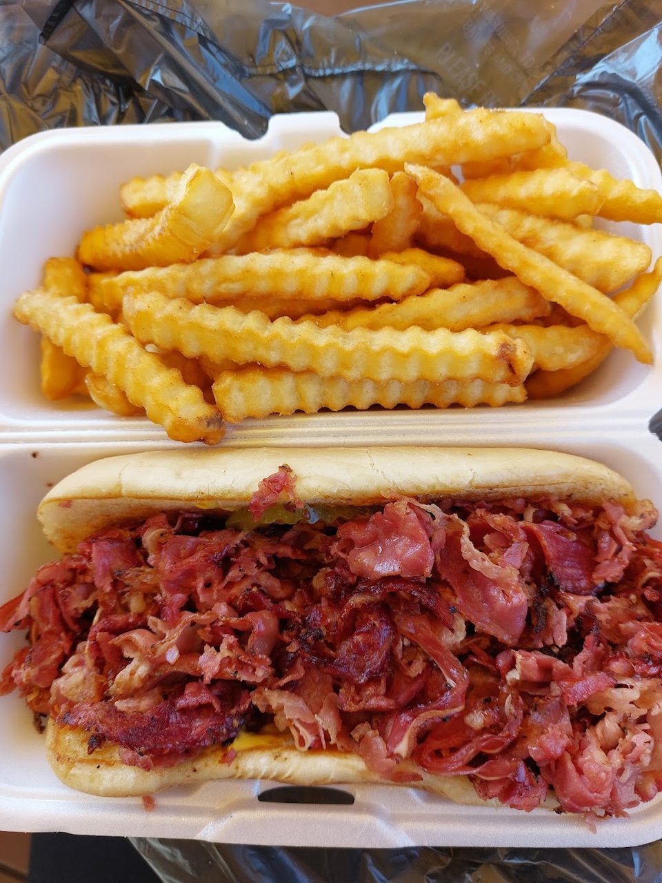Drive-in menu featuring burgers and fries.